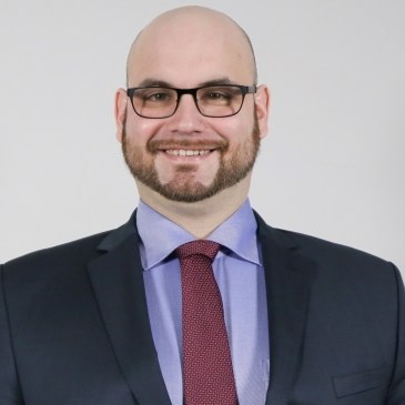 Dr. Michael KOMUCZKY